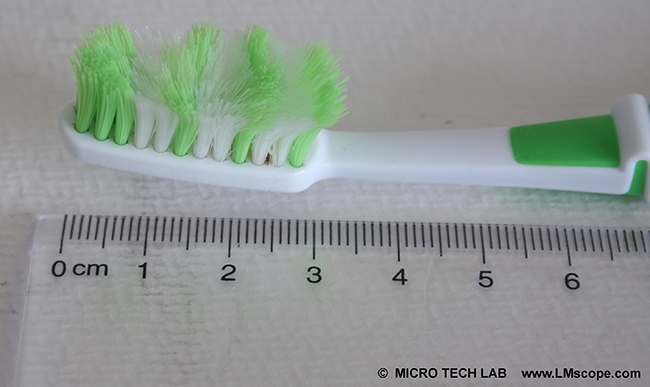 toothbrush with signs of use macroscope 10x magnification