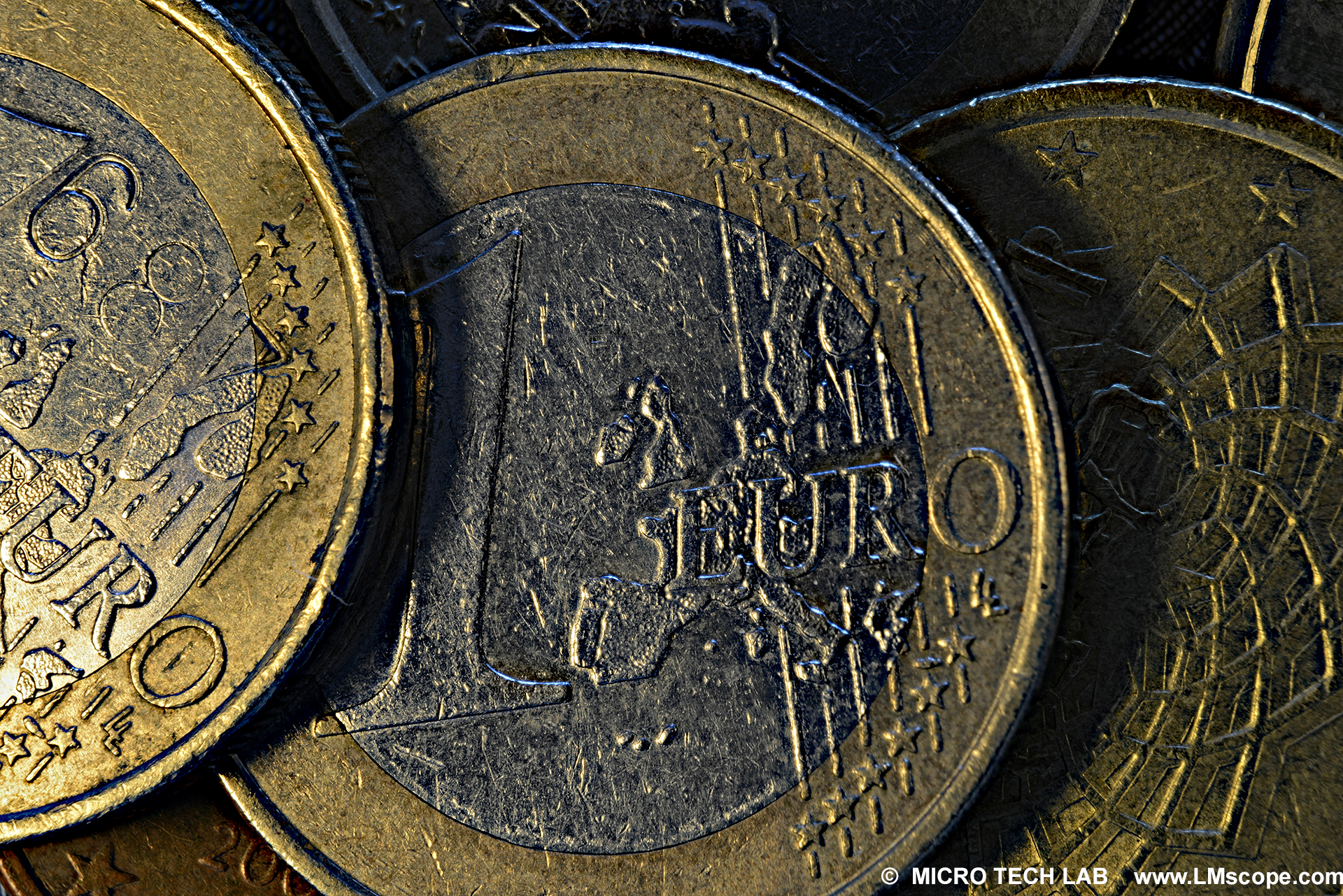 Euro coins with mysterious press cut